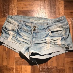 Distressed light wash jean shorts